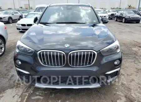 BMW X1 XDRIVE2 2019 vin WBXHT3C58K5L36670 from auto auction Copart