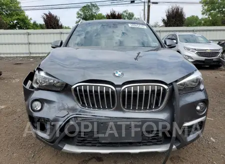 BMW X1 XDRIVE2 2018 vin WBXHT3C32J5K29451 from auto auction Copart