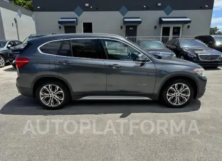 BMW X1 XDRIVE2 2016 vin WBXHT3C37G5E54590 from auto auction Copart