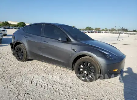 TESLA MODEL Y 2023 vin 7SAYGDEE1PF878545 from auto auction Copart