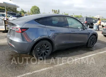 TESLA MODEL Y 2023 vin 7SAYGDEE6PA030576 from auto auction Copart