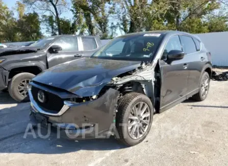 Mazda CX-5 2021 2021 vin JM3KFBAY0M0424413 from auto auction Copart