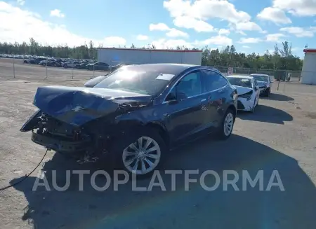 TESLA MODEL X 2020 vin 5YJXCDE25LF300162 from auto auction Iaai