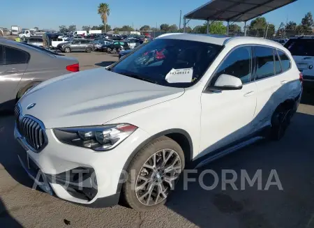 BMW X1 2021 vin WBXJG7C04M5S61566 from auto auction Iaai