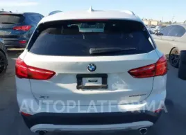 BMW X1 2021 vin WBXJG7C04M5S61566 from auto auction Iaai