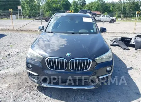 BMW X1 2018 vin WBXHU7C38J5H40380 from auto auction Iaai