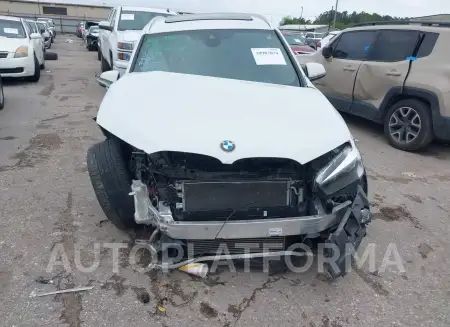 BMW X1 2019 vin WBXHU7C57K5L10789 from auto auction Iaai