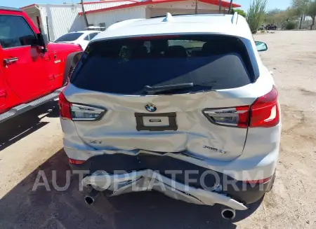 BMW X1 2021 vin WBXJG7C00M5U25847 from auto auction Iaai