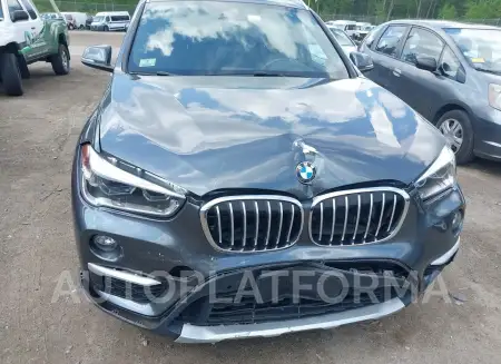 BMW X1 2019 vin WBXHT3C55K3H36376 from auto auction Iaai