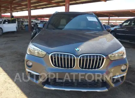 BMW X1 2018 vin WBXHU7C32J5H38964 from auto auction Iaai