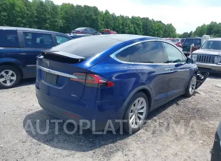 TESLA MODEL X 2018 vin 5YJXCBE21JF139407 from auto auction Iaai