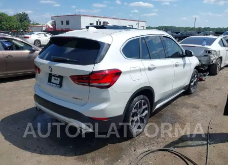 BMW X1 2021 vin WBXJG9C02M5T32971 from auto auction Iaai