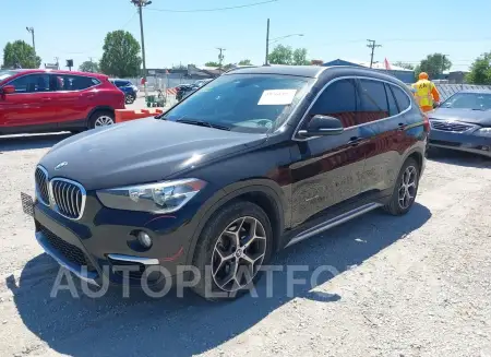 BMW X1 2018 vin WBXHT3C32J5K25089 from auto auction Iaai