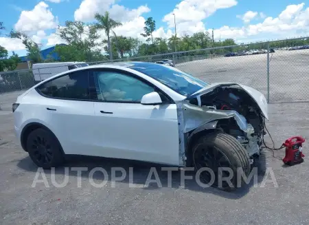 TESLA MODEL Y 2022 vin 7SAYGDEE0NF358091 from auto auction Iaai