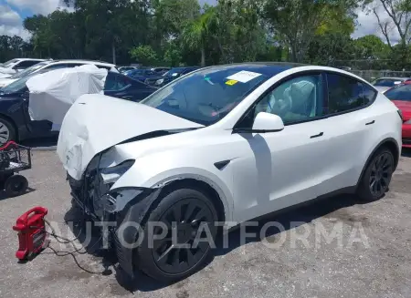 TESLA MODEL Y 2022 vin 7SAYGDEE0NF358091 from auto auction Iaai