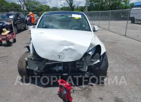 TESLA MODEL Y 2022 vin 7SAYGDEE0NF358091 from auto auction Iaai