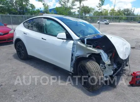 TESLA MODEL Y 2022 vin 7SAYGDEE0NF358091 from auto auction Iaai