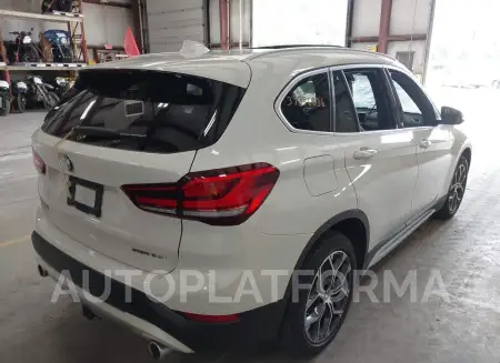 BMW X1 2021 vin WBXJG7C07M5T10338 from auto auction Iaai