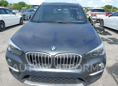 BMW X1 2019 vin WBXHU7C53K3H45744 from auto auction Iaai