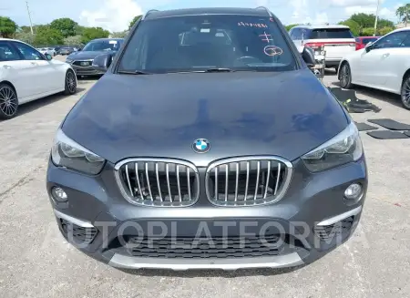 BMW X1 2019 vin WBXHU7C53K3H45744 from auto auction Iaai