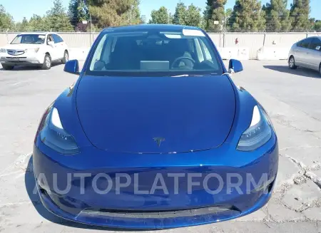 TESLA MODEL Y 2023 vin 7SAYGAEE4PF906417 from auto auction Iaai