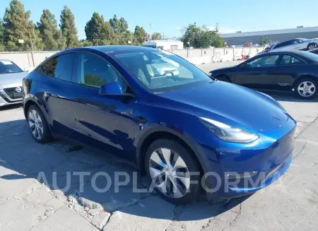 TESLA MODEL Y 2023 vin 7SAYGAEE4PF906417 from auto auction Iaai