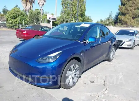 TESLA MODEL Y 2023 vin 7SAYGAEE4PF906417 from auto auction Iaai