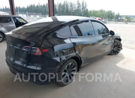 TESLA MODEL Y 2023 vin 7SAYGDEE9PF880205 from auto auction Iaai