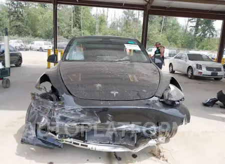 TESLA MODEL Y 2023 vin 7SAYGDEE9PF880205 from auto auction Iaai