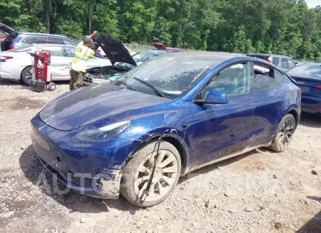 TESLA MODEL Y 2023 vin 7SAYGDEE2PF607672 from auto auction Iaai