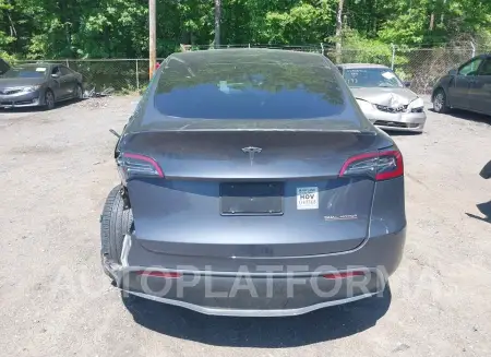 TESLA MODEL Y 2023 vin 7SAYGDEF7PF801042 from auto auction Iaai