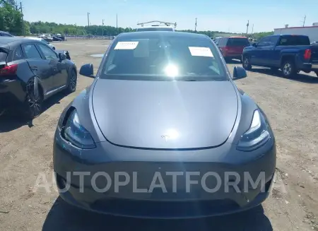 TESLA MODEL Y 2023 vin 7SAYGDEF7PF801042 from auto auction Iaai