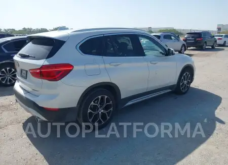 BMW X1 2021 vin WBXJG7C04M5T76880 from auto auction Iaai