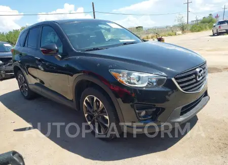 MAZDA CX-5 2016 vin JM3KE4DY5G0680562 from auto auction Iaai