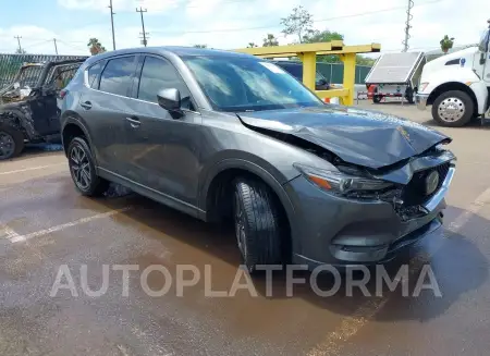 MAZDA CX-5 2018 vin JM3KFADM0J0302083 from auto auction Iaai