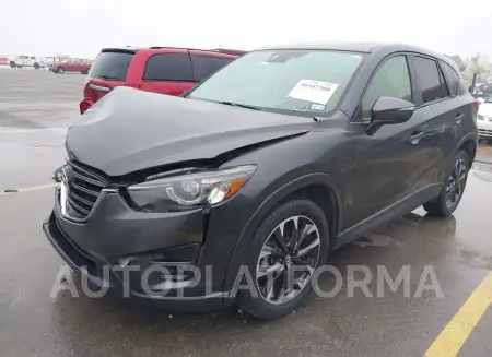 MAZDA CX-5 2016 vin JM3KE4DY3G0845766 from auto auction Iaai