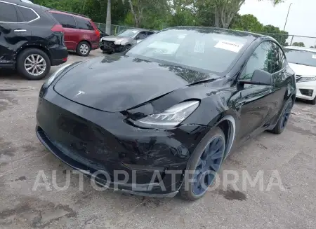 TESLA MODEL Y 2021 vin 5YJYGAEE9MF112117 from auto auction Iaai