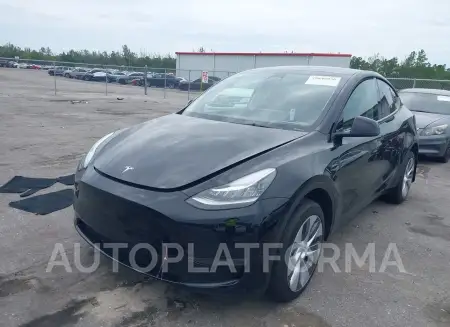 TESLA MODEL Y 2023 vin 7SAYGDEE5PA107728 from auto auction Iaai