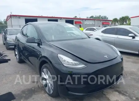 TESLA MODEL Y 2023 vin 7SAYGDEE5PA107728 from auto auction Iaai