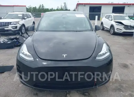 TESLA MODEL Y 2023 vin 7SAYGDEE5PA107728 from auto auction Iaai