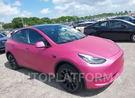 TESLA MODEL Y 2023 vin 7SAYGDEE2PA128861 from auto auction Iaai