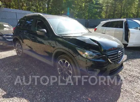 Mazda CX-5 2016 2016 vin JM3KE4DY4G0701031 from auto auction Iaai