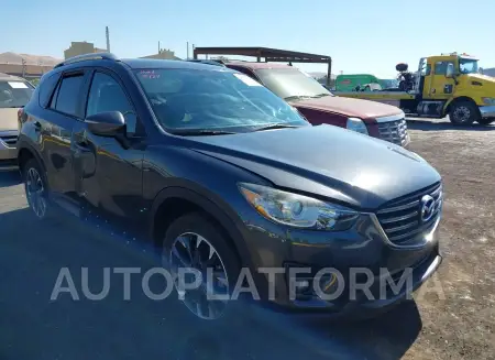 Mazda CX-5 2016 2016 vin JM3KE2DY2G0741886 from auto auction Iaai