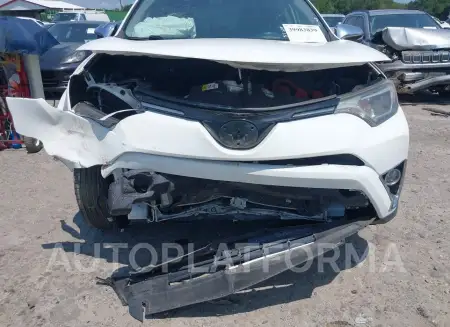 TOYOTA RAV4 HYBRID 2016 vin JTMRJREV4GD059147 from auto auction Iaai