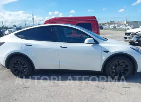 TESLA MODEL Y 2023 vin 7SAYGDEE2PA110084 from auto auction Iaai