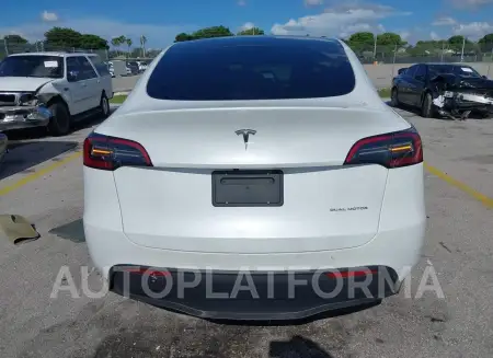 TESLA MODEL Y 2023 vin 7SAYGDEE2PA110084 from auto auction Iaai