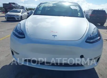 TESLA MODEL Y 2023 vin 7SAYGDEE2PA110084 from auto auction Iaai