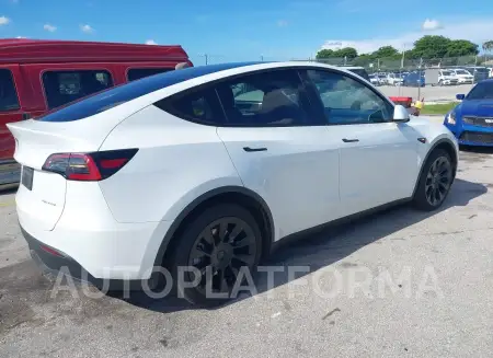 TESLA MODEL Y 2023 vin 7SAYGDEE2PA110084 from auto auction Iaai