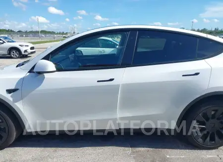 TESLA MODEL Y 2023 vin 7SAYGDEE2PA110084 from auto auction Iaai