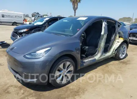 TESLA MODEL Y 2023 vin 7SAYGDEE8PA079956 from auto auction Iaai